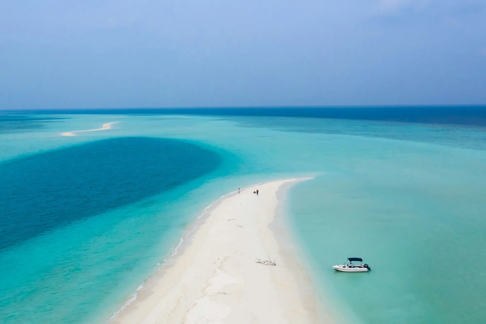 A white sandbank in a turquoise lagoon in the Maldives