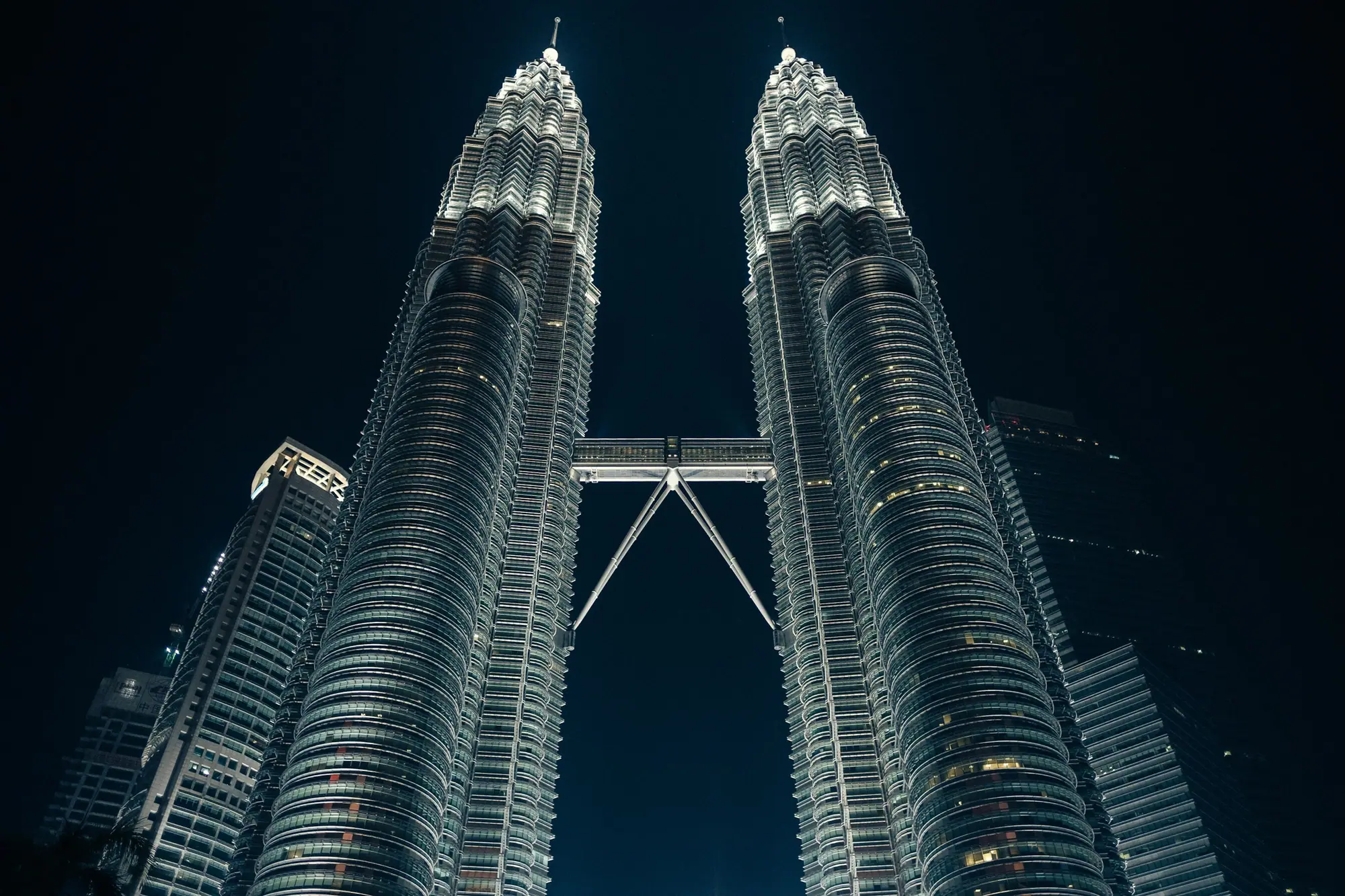 The Petronas Twin Towers in Kuala Lumpur, lit up at night